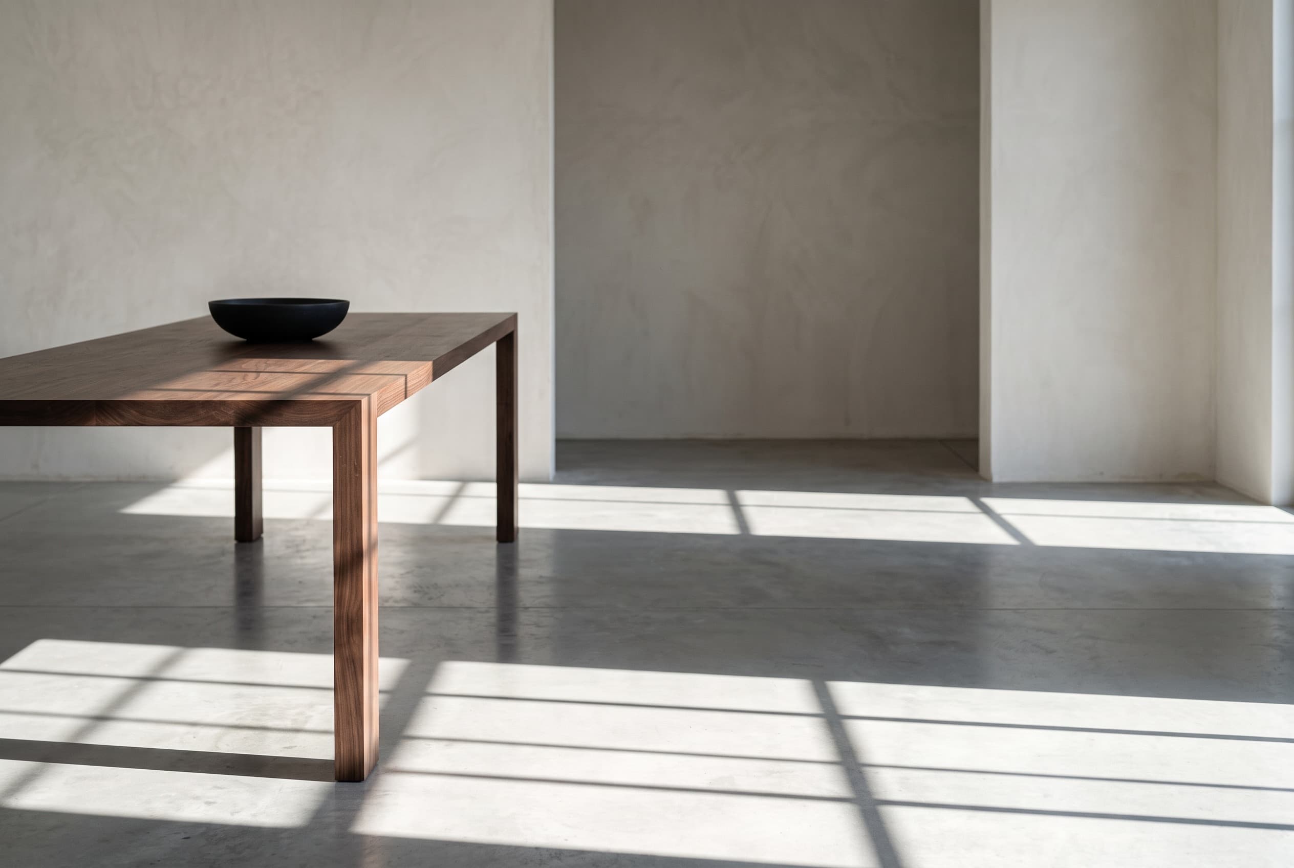 Architectural Walnut & Quartzite Dining Table